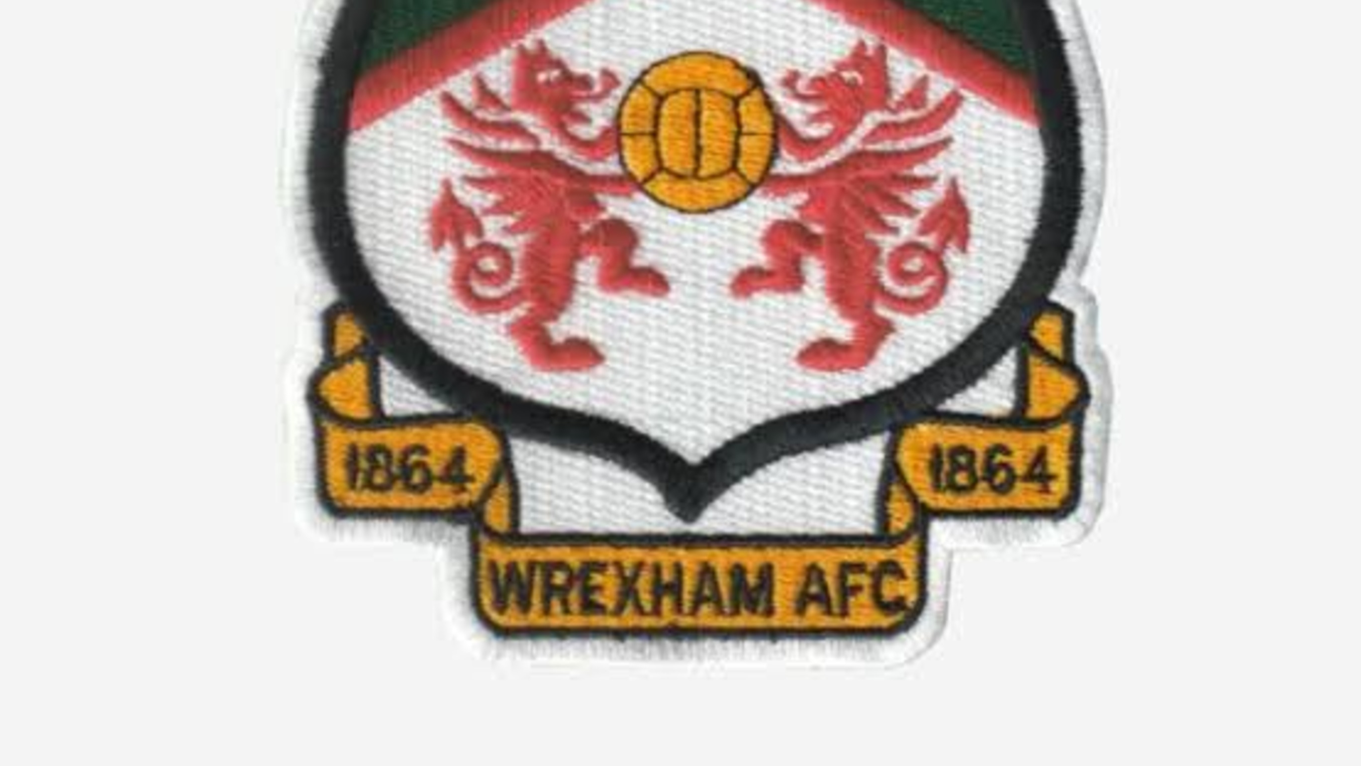 **Wrexham are no longer treating their first Championship season as a period of adjustment—they are actively strengthening for it.**

The club have confirmed permanent signings of right-back Issa Kabore from Manchester City and centre-back Jacques Ekomie from French side Angers, adding two experienced defenders in the same week as the transfer deadline approaches.

Both deals reflect a deliberate strategy: bringing in players with senior European experience rather than continuing to rely solely on lower-league recruitment, a notable shift for a club still adjusting to life outside League One.

## Issa Kabore returns on a permanent deal

Kabore spent last season on loan at Wrexham from Manchester City, making 32 appearances in all competitions under Phil Parkinson. That loan spell has now been converted into a permanent transfer worth up to £4.75 million, according to [BBC Sport's report](https://www.bbc.com/sport/football/articles/cn5dr0vyd3ro) on the deal, with City retaining a 20% sell-on clause and matching rights on any future sale.

The move ends a nomadic six-year spell for the 25-year-old Burkina Faso international, who joined City from Belgian club KV Mechelen in 2020 but never made a senior appearance for the Premier League club across seven separate loan spells. Kabore has signed a three-year contract at the Racecourse Ground, giving Wrexham long-term certainty at right-back after a season in which his form justified the permanent move.

## Jacques Ekomie adds Ligue 1 experience

Wrexham's second signing brings a different profile entirely. Ekomie, a 23-year-old Gabon international centre-back, arrives after making 32 Ligue 1 appearances for Angers last season. He has signed a four-year deal, running through 2030, for a fee reported to be worth around £8 million to the French club.

Speaking after his move was confirmed, Ekomie described the switch as a significant career step. "It is a very big and interesting project for me—I'm here to progress, and I'm very happy to be here," he said. "I want to achieve great things at Wrexham."

Notably, Ekomie had also attracted interest from West Ham United and German club Hamburg before choosing Wrexham, according to [BBC Sport](https://www.bbc.com/sport/football/articles/cn5dr0vyd3ro), underlining the growing credibility of the club's project since promotion.

## What both signings say about Wrexham's project

Taken together, the two deals represent Wrexham's fifth incoming signing of the transfer window and their most significant financial outlay to date on permanent transfers. Bringing in a Ligue 1 regular and converting a Premier League loanee into a permanent squad member suggests the club is targeting players with a proven level above League One, rather than simply adding depth.

That approach also addresses specific needs. Ekomie provides competition and cover at centre-back, where left-back convert Liberato Cacace has been troubled by injuries, while Kabore's arrival locks down right-back for the medium term rather than leaving Parkinson to negotiate a new loan every summer.

## Can Wrexham build on this momentum?

Two permanent defensive signings will not guarantee Championship survival, but they suggest a club moving beyond the feel-good story of its rapid rise and into serious squad-building for a tougher level of competition. With the transfer deadline approaching on 1 September, further additions remain possible, and Wrexham's business this week indicates they are not planning to stand still.

For a club that has enjoyed rapid promotions in recent seasons, converting ambition into results at Championship level will be the real test. Recruiting proven performers like Kabore and Ekomie gives Parkinson's side a stronger platform than many pundits expected heading into the campaign.