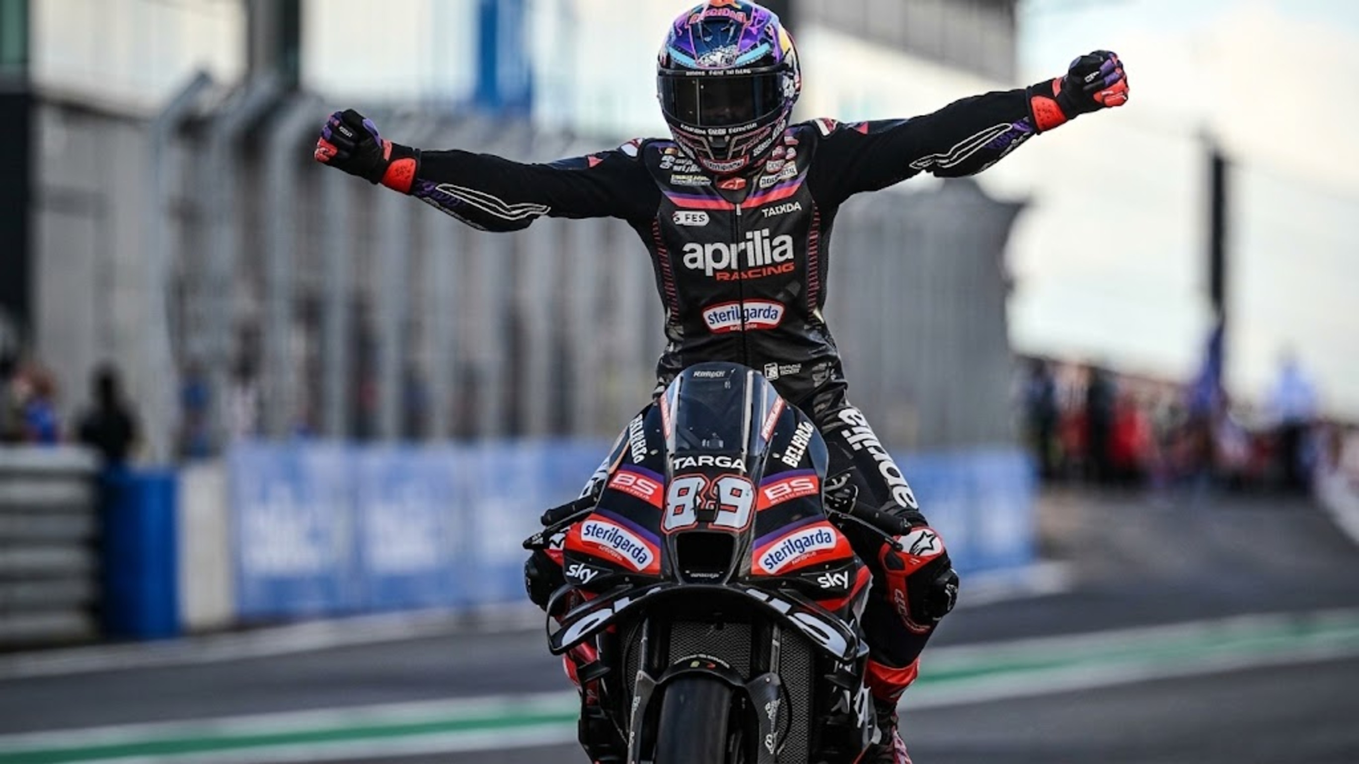 Jorge Martin leads the 2026 MotoGP championship by 19 points over Marc Marquez. Marco Bezzecchi sits just five points further back, in third. All three have won four grands prix apiece this season.
Ducati's own general manager, Gigi Dall'Igna, says the title will simply go to whoever "keeps their head" over the final nine rounds. That's an unusually honest admission from a team that's dominated MotoGP for years.
## Why Ducati suddenly isn't running away with it
Marc Marquez arrived this season chasing a record-equalling eighth world title and looked, for stretches, like the overwhelming favorite. Then Aprilia responded. Bezzecchi and Martin combined for a run of four consecutive one-two finishes, including a statement result at Mugello, on Ducati's home turf in front of more than 88,000 fans, that snapped Ducati's four-year winning streak at that circuit.
That's not a fluke result. It's a genuine manufacturer-level shift, with Aprilia's RS-GP closing a gap that had separated the two brands for years.
## Why none of the three leaders can pull away
Each rider has hit a rough patch exactly when they looked poised to seize control. Marquez missed two grands prix through injury and was 102 points down on the championship lead when he returned, then clawed his way back to within striking distance. Bezzecchi built an early points lead through three straight wins, then suffered four consecutive scoreless Sundays heading into the summer break. Martin has quietly banked points all season without consistently being the fastest rider on track.
That pattern, someone building an advantage and then immediately losing it, is exactly why analysts are calling this the most unpredictable MotoGP season in years.
## Why a two-manufacturer title fight changes the racing itself
When one manufacturer dominates, races become largely about which of that manufacturer's riders finishes ahead of the other. A genuine fight between Ducati and Aprilia changes the calculus entirely. Every race weekend now carries real developmental stakes for both factories, not just points implications for the riders themselves, since a strong result validates a manufacturer's technical direction heading into the next round of updates.
That's part of why the racing itself has felt more volatile this year. Teams are pushing updates and setup changes more aggressively than they would during a season with one clear dominant package.
## What the final stretch actually demands
Dall'Igna's framing, that consistency under pressure will decide this more than outright speed, reflects something real about how tight title races usually resolve. With three riders this closely matched, a single mechanical failure, a costly crash, or one rider simply having a calmer run of races down the stretch becomes the deciding factor, more than raw pace on any single Sunday.
Marquez has the experience of navigating exactly this kind of pressure before. Bezzecchi and Martin are both still building a track record in genuine title-deciding races.
Three riders, two manufacturers, and nine rounds left with barely two dozen points separating the entire lead group. Is this the start of a genuine multi-year rivalry between Ducati and Aprilia, or is one of these three riders about to pull away the moment the pressure actually starts to matter?