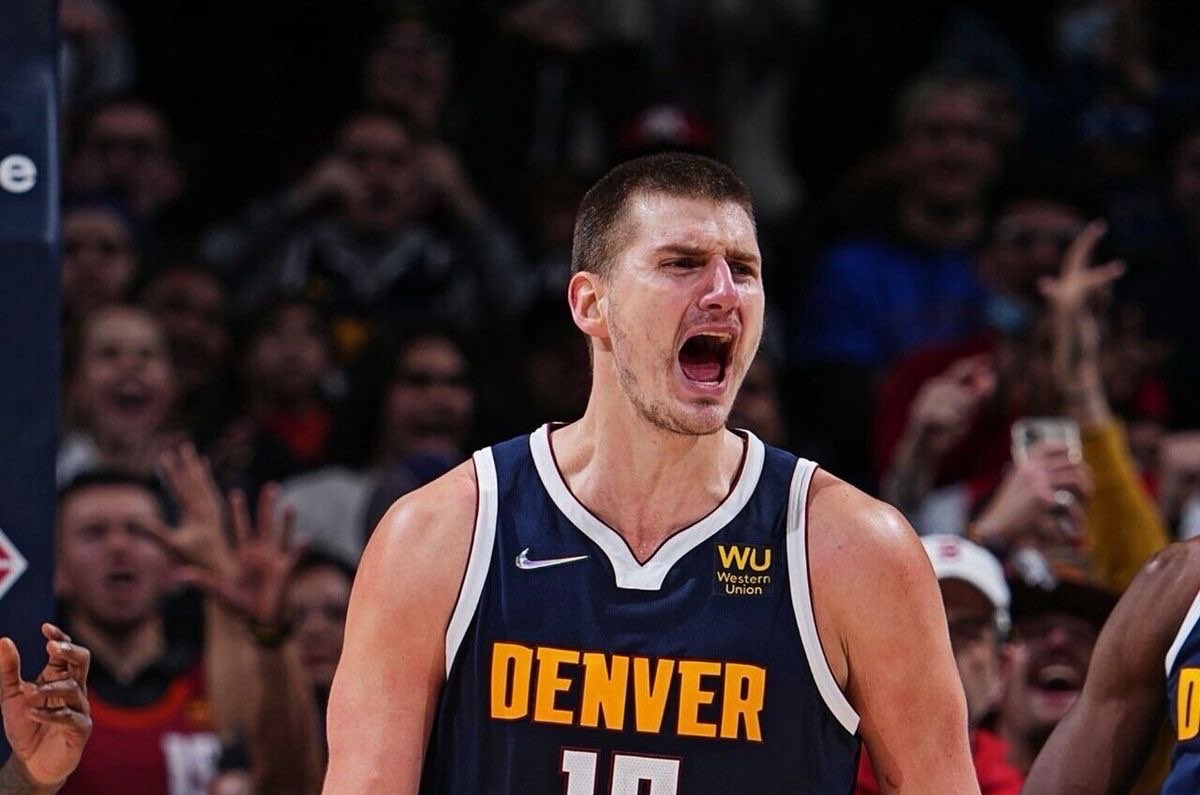 The Taco Bell Draft Pick

In 2014, while the NBA world was watching a Taco Bell commercial for the "Quarito," a 6'11" Serbian teenager with a soft touch and a slower-than-average foot speed was drafted 41st overall. Nobody knew it then, but the Denver Nuggets had just pulled off the greatest heist in basketball history.

Fast forward to 2026: Nikola Jokić is no longer just a "draft steal." He is a three-time MVP, a Finals MVP, an NBA Champion, and arguably the greatest passing big man to ever lace up sneakers.

I. From Sombor to the Stars

Born in Sombor, Serbia, Jokić grew up in a cramped two-bedroom apartment with his parents, grandmother, and two older brothers, Strahinja and Nemanja. His brothers provided the physical toughness, but Nikola brought the "touch."

• The Early "Doughboy" Years: In his youth, Jokić was known more for his love of Coca-Cola and burek than his vertical leap.

• The Mega Basket Breakthrough: It was in the Adriatic League where his "Magic Johnson in a center’s body" style began to emerge.

• The Horse Racing Parallel: Even then, his first love was horses. To understand Jokić, you have to understand the pace of a harness race—it's about rhythm, timing, and finding the gap before it opens.

II. The Anatomy of "The Joker"

Jokić doesn't play basketball; he plays chess at 180 beats per minute. Here is why his game is impossible to guard:

1. The Vision

Most centers see the rim. Jokić sees the four other players moving in relation to the rim. His "water polo" passes—one-handed heaves that land perfectly in a shooter’s pocket—are legendary.

2. The Sombor Shuffle

When the clock is winding down, Jokić leans back on his right foot and launches a high-arcing shot that seems to touch the rafters.

3. The Efficiency

As of February 2026, Jokić continues to shatter "Player Efficiency Rating" (PER) records. He doesn't take bad shots because he doesn't need to. If he’s doubled, he passes. If he’s single-covered, he scores.

III. Career Milestones (The Resume)

IV. The Man Beyond the Hardwood

The most "Jokić" moment in history? After winning the 2023 NBA Championship, his first response wasn't about the party in Vegas. It was: "The job is done, we can go home now."

He is the "Anti-Superstar."

• No Social Media: You won't find him tweeting or posting workout reels.

• Horse Racing Obsession: He owns over 45 horses and spends his offseasons at the track in Sombor.

• Family First: His brothers and wife, Natalija, are fixtures at every game, representing the tight-knit circle that keeps him grounded.

V. Legacy: The Greatest Center Ever?

The debate used to be about Shaq vs. Kareem vs. Wilt. Now, Jokić has entered the chat. He doesn't have Shaq's power or Kareem's skyhook, but he has a basketball IQ that might be higher than all of them. He has proven that you don't need a 40-inch vertical to dominate the most athletic league on earth. You just need to be two steps ahead of everyone else.

Nikola Jokić is a reminder that basketball is a game of skill and intelligence. Whether he's throwing a cross-court laser or cleaning his stables in Serbia, he does it with a unique grace that we may never see again.

