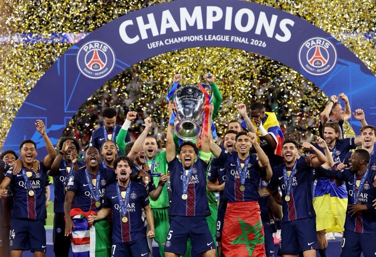 Champions League Final Decided by the Finest Margins



Football doesn’t always reward dominance. Sometimes, it rewards composure. Sometimes, courage. And on rare nights like this — it rewards nerve.



The UEFA Champions League final between Paris Saint-Germain and Arsenal delivered exactly what football fans live for: tension, drama, controversy, and ultimately — heartbreak for one side and history for the other.



After 120 minutes of relentless football ended in a 1–1 draw, it all came down to penalties. And in that moment, PSG held their nerve to win 4–3, etching their name into European glory.



⸻



⚔️ The Build-Up: A Clash of Philosophies



This wasn’t just a final — it was a battle of identities.



* PSG came in as an attacking powerhouse, scoring the most goals in the competition.

* Arsenal arrived with discipline, structure, and one of the best defensive records in Europe.



It was billed as:



The Best Attack vs The Best Defence



And the game lived up to that narrative.



⸻



🔥 First Half: Tactical Chess, Not Chaos



From the opening whistle, it was clear this wouldn’t be a goal-fest.



Arsenal set up compactly, cutting off central passing lanes and forcing PSG wide. Their defensive structure frustrated PSG’s fluid attack.



PSG, however, controlled possession — probing, waiting, looking for cracks.



Despite moments of brilliance on both sides, clear chances were limited. It was a final defined by caution early on — neither team willing to blink first.



⸻



⚽ The Breakthrough: Tension Explodes



Eventually, the deadlock was broken.



The first goal came as a result of persistence — a moment where defensive discipline slipped just enough.



But Arsenal responded.



They didn’t panic. They didn’t collapse.



Instead, they showed why they had come so far — resilience, composure, and belief.



The equalizer brought the game back to life.



⸻



⏱️ Second Half: Pressure, VAR, and Chaos



The second half introduced more intensity — and controversy.



A crucial VAR decision overturned what could have been a decisive moment. The tension inside the stadium was palpable.



Players began to tire, tackles became heavier, and emotions started to spill over.



Late in the game:



* João Neves received a yellow card deep into stoppage time.

* The physicality of the match increased significantly.



Still, neither side could find the winning goal.



⸻



🕰️ Extra Time: Fatigue Meets Determination



Extra time wasn’t about beauty — it was about survival.



Cramp. Exhaustion. Mental strain.



Key moments included:



* Yellow cards for Viktor Gyökeres, Declan Rice, and even Mikel Arteta on the touchline.

* A late booking for Nuno Mendes, highlighting how stretched the game had become.



Despite chances, neither team could break the deadlock.



And so, the final would be decided the most brutal way possible:



Penalties.



⸻



🎯 The Shootout: Where Heroes Are Made



Penalty shootouts are less about skill — and more about mentality.



Here’s how it unfolded:



Round 1



* PSG: Gonçalo Ramos ✅

* Arsenal: Viktor Gyökeres ✅



1–1



⸻



Round 2



* PSG: Désiré Doué ✅

* Arsenal: Eberechi Eze ❌



PSG lead 2–1



⸻



Round 3



* PSG: Nuno Mendes ❌

* Arsenal: Declan Rice ✅



2–2



⸻



Round 4



* PSG: Achraf Hakimi ✅

* Arsenal: Gabriel Martinelli ✅



3–3



⸻



Final Round



* PSG: Lucas Beraldo ✅

* Arsenal: Gabriel Magalhães ❌



PSG win 4–3



⸻



💔 Arsenal: So Close, Yet So Far



For Arsenal, this will hurt.



They matched PSG. They fought. They defended brilliantly.



But in the end, two missed penalties cost them everything.



Still, this run proves something important:



Arsenal are no longer contenders — they are elite.



Their young core, tactical discipline, and resilience signal that this won’t be their last final.



⸻



🏆 PSG: From Pressure to Glory



For PSG, this victory is monumental.



After years of near-misses, criticism, and expectations, they finally delivered on the biggest stage.



This wasn’t just about talent — it was about character.



They:



* Stayed calm under pressure

* Recovered from setbacks

* Held their nerve when it mattered most



And in doing so, they achieved what they’ve been chasing for years.



⸻



🧠 Tactical Analysis: Why PSG Won



1. Mental Strength



PSG handled the pressure of penalties better. Simple.



2. Squad Depth



Their ability to rotate and maintain intensity into extra time made a difference.



3. Composure in Key Moments



Even after a missed penalty, they didn’t collapse.



⸻



🔍 Key Takeaways



* Finals are rarely about dominance — they’re about moments

* Arsenal’s defense proved elite, but lacked the killer edge

* PSG showed growth — mentally and tactically

* Penalties remain football’s cruelest decider



⸻



🌍 The Bigger Picture



This match will be remembered for more than just the result.



It was:



* A tactical masterclass

* A psychological battle

* A showcase of Europe’s elite



And most importantly…



A reminder of why we love football.



⸻



📝 Final Thoughts



Football can be beautiful.

Football can be cruel.



And sometimes, it’s both at the same time.



On this night:



* Arsenal gave everything

* PSG took their moment



And history was written — from 12 yards.



⸻



📢 Ready-to-Post Caption (Bonus for You)



“FROM PARIS WITH NERVES OF STEEL 🇫🇷🔥



PSG are CHAMPIONS after a dramatic 4–3 penalty shootout win over Arsenal 🤯



1–1 after 120 minutes…

Misses, pressure, chaos…



And in the end — PSG held their nerve 💪🏆



Football. Bloody hell.”**